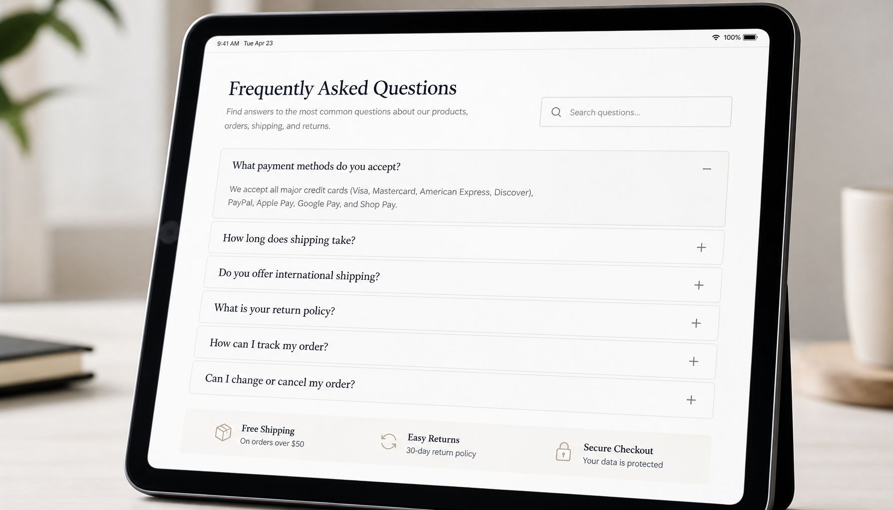 Beautifully formatted FAQ page on a tablet with expandable sections